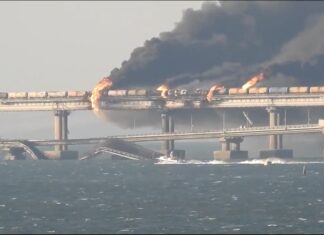 Kerch Bridge Connecting Crimea to Russia Attacked, Sections Collapse, Train Cars Burn