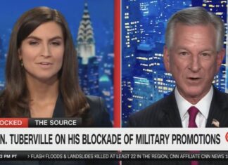 Kaitlan Collins Introduces Tommy Tuberville to Merriam Webster – “A white nationalist is racist, Senator.”