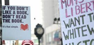 Moms For Liberty Meets In Philly. Greeted With Signs Like ‘Klanned Karenhood’