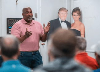 Beyond Belief, Robinson Campaigning With Cardboard Cutout Of Trumps