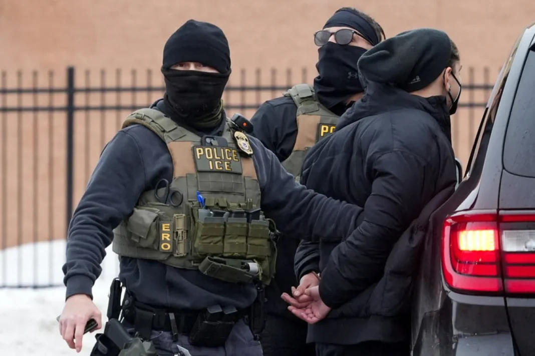 Members of U.S. Immigration and Customs Enforcement (ICE) conduct raids in Minneapolis